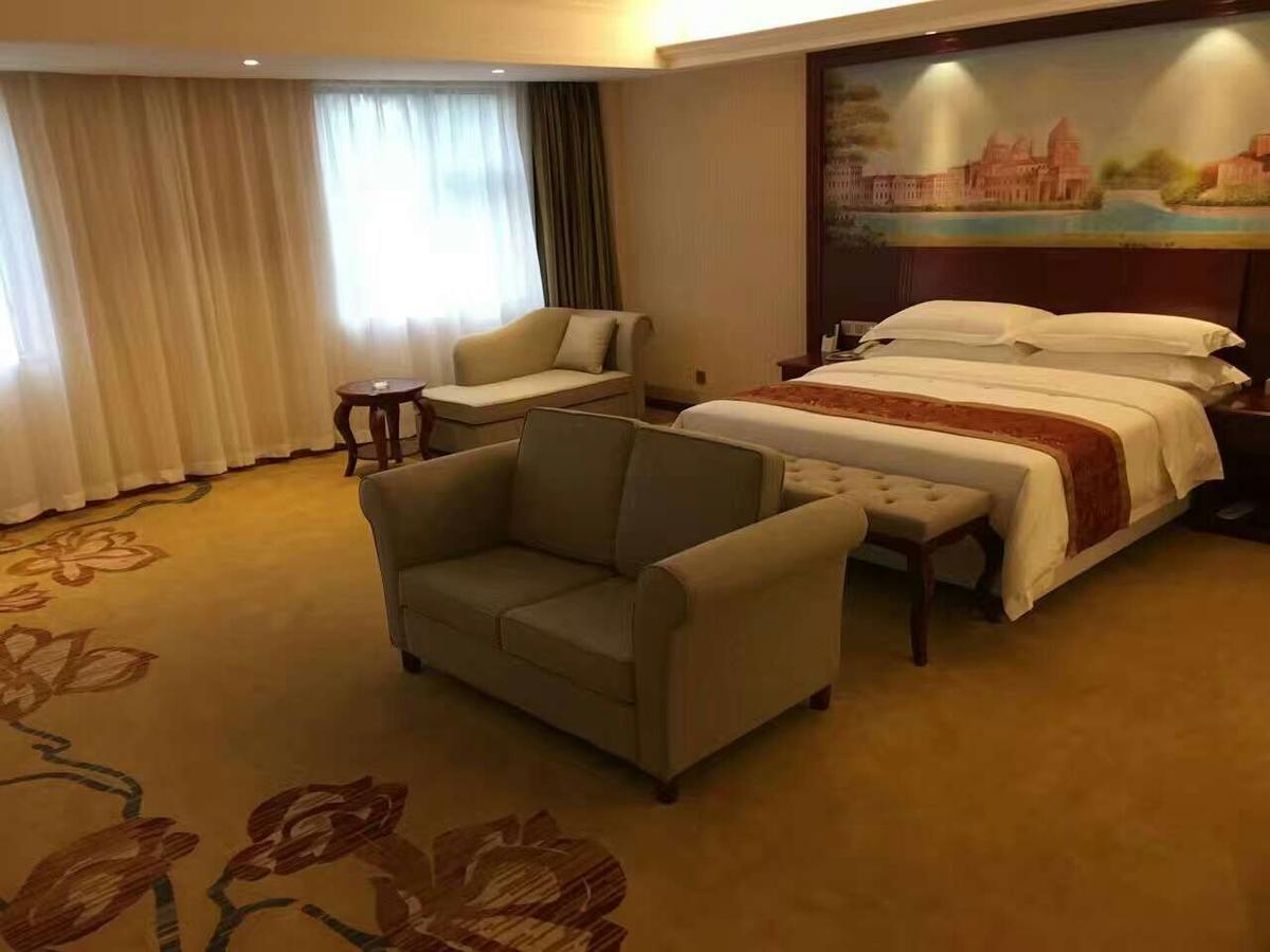 Vienna Hotel Zhongshan Guzhen Town Center Exterior foto